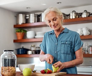 a woman preparing a healthy meal