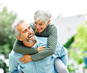 a mature couple laughing and spending time together